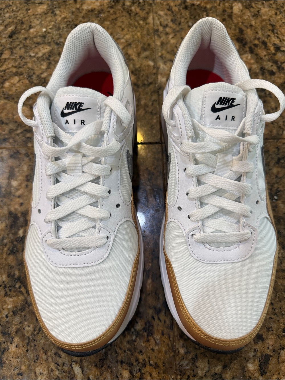 Nike Women’s White Sneakers with Gold Trim